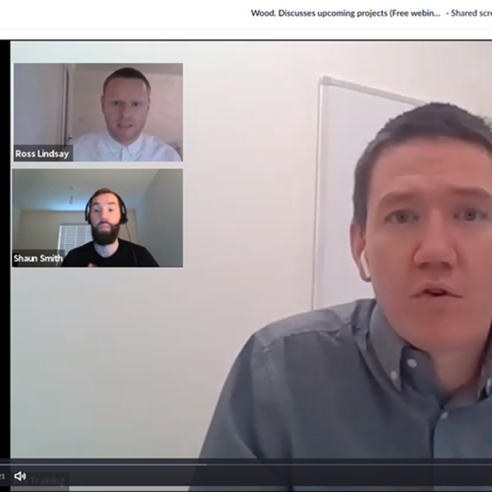 A Zoom video call in progress showing two participants. One is speaking actively, and two smaller participant windows are displayed: one shows a person labeled Ross Lindsay, and the other Shaun Smith.